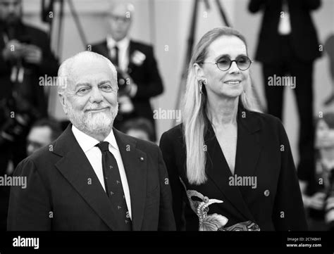 Aurelio De Laurentiis and Jacqueline Marie Baudit walk the red .